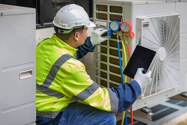 Professional Ac Installation technician working in Kingsford Heights, IN
